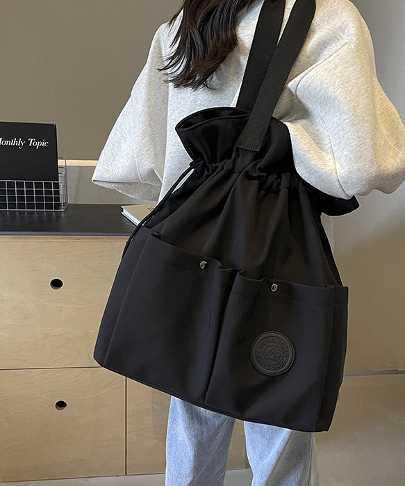 Stylish Black Pockets Drawstring Canvas Satchel Handbag