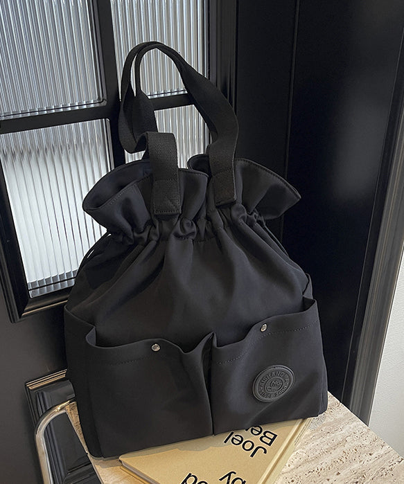 Stylish Black Pockets Drawstring Canvas Satchel Handbag